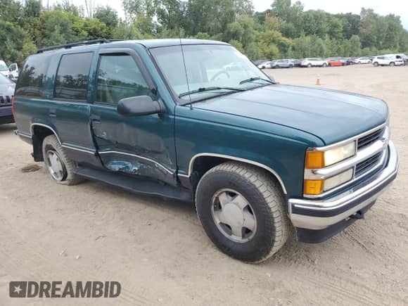1997 Chevrolet Tahoe с VIN 1GNEK13R4VJ419381, выставлен на аукционе Copart как лот 80735365 с пробегом 158 890 миль миль и Списание • Salvage title. История ставок и продаж доступна на DreamBid. Изображение 4.