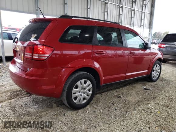 2017 Dodge Journey SE с VIN 3C4PDCAB2HT581889, выставлен на аукционе Copart как лот 84604785 с пробегом 111 807 миль миль и Списание • Salvage title. История ставок и продаж доступна на DreamBid. Изображение 3.