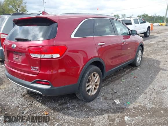 2016 Kia Sorento EX with VIN 5XYPH4A15GG012039, listed as a IAAI auction lot 43300052 with 103,439 mi miles and . Bid and sale history available at DreamBid. Image 4.