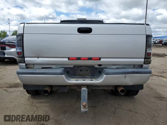 2001 Dodge RAM с VIN 1B7MF33W61J551711, выставлен на аукционе Copart как лот 58213265 с пробегом 104 586 миль миль и Чистый • Clean title. История ставок и продаж доступна на DreamBid. Изображение 6.