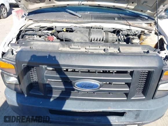 2009 Ford Econoline Cargo Commercial z VIN 1FTNE24W19DA72591, wystawiony jako IAAI lot #43074984 z przebiegiem 239 039 mil mil oraz . Historia ofert i sprzedaży dostępna na DreamBid. Obrazek 10.