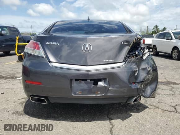 2012 Acura TL Auto z VIN 19UUA9F23CA011764, wystawiony jako Copart lot #57108085 z przebiegiem 197 834 mil mil oraz Szkoda całkowita • Salvage title. Historia ofert i sprzedaży dostępna na DreamBid. Obrazek 6.