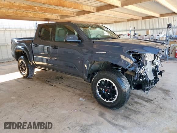 2024 Toyota Tacoma TRD Off Road with VIN 3TMLB5JN3RM035169, listed as a Copart auction lot 86511735 with 27,047 mi miles and Clean title. Bid and sale history available at DreamBid. Image 4.
