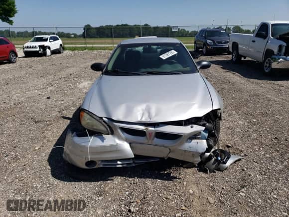 2003 Pontiac Grand Am SE with VIN 1G2NE52F73C302849, listed as a Copart auction lot 61597295 with 94,732 mi miles and Clean title. Bid and sale history available at DreamBid. Image 5.