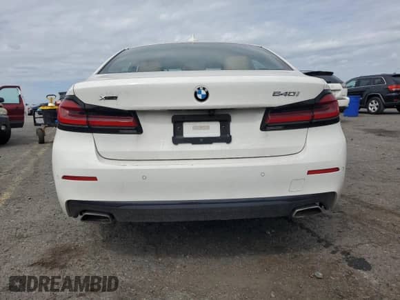 2022 BMW 5 Series 540i xDrive z VIN WBA73BJ01NWX52548, wystawiony jako Copart lot #69517675 z przebiegiem 56 665 mil mil oraz Szkoda całkowita • Salvage title. Historia ofert i sprzedaży dostępna na DreamBid. Obrazek 6.