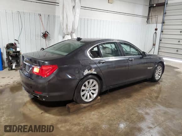 2011 BMW 7 Series 750i xDrive with VIN WBAKC6C51BC394293, listed as a Copart auction lot 55119865 with Not provided miles and Salvage title. Bid and sale history available at DreamBid. Image 3.