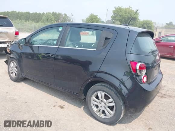 2013 Chevrolet Sonic LT with VIN 1G1JC6SG8D4244494, listed as a IAAI auction lot 42898475 with 74,710 mi miles and . Bid and sale history available at DreamBid. Image 3.