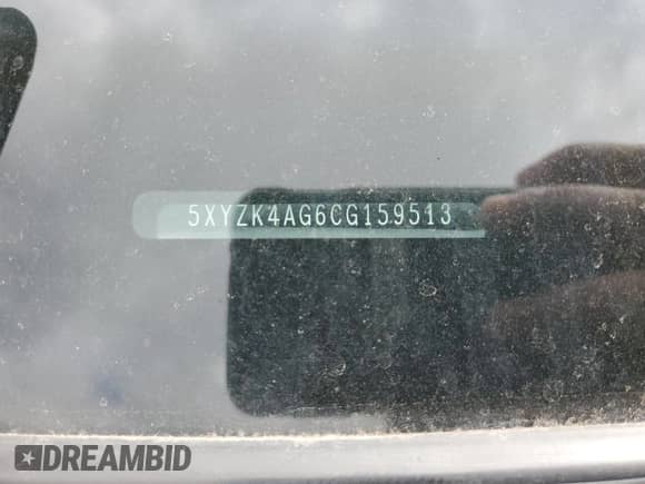 2012 Hyundai Santa Fe Limited с VIN 5XYZK4AG6CG159513, выставлен на аукционе Copart как лот 52142205 с пробегом 148 155 миль миль и Списание • Salvage title. История ставок и продаж доступна на DreamBid. Изображение 13.