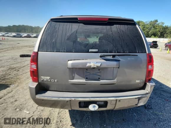 2009 Chevrolet Tahoe LTZ с VIN 1GNFK33039R102264, выставлен на аукционе Copart как лот 70513785 с пробегом 234 550 миль миль и Списание • Salvage title. История ставок и продаж доступна на DreamBid. Изображение 6.