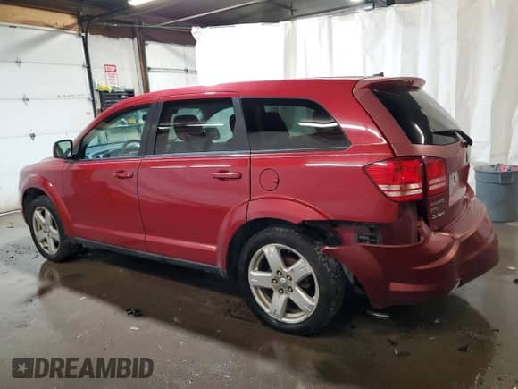 2009 Dodge Journey SXT with VIN 3D4GH57V59T598045, listed as a Copart auction lot 63745355 with 119,955 mi miles and Salvage title. Bid and sale history available at DreamBid. Image 2.