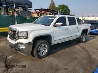 2017 GMC Sierra 1500 SLT с VIN 3GTU2NEC1HG360896, выставлен на аукционе Copart как лот 67150805 с пробегом 124 165 миль миль и Списание • Salvage title. История ставок и продаж доступна на DreamBid. Изображение 1.