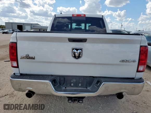 2014 Ram 1500 Big Horn z VIN 1C6RR7LT0ES445255, wystawiony jako Copart lot #82099285 z przebiegiem 126 730 mil mil oraz Szkoda całkowita • Salvage title. Historia ofert i sprzedaży dostępna na DreamBid. Obrazek 6.