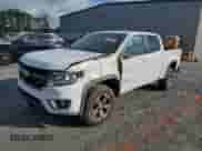 2018 Chevrolet Colorado 4WD Z71 with VIN 1GCGTDEN4J1179625, listed as a Copart auction lot 65073345 with 96,243 mi miles and Salvage title. Bid and sale history available at DreamBid. Image 1.