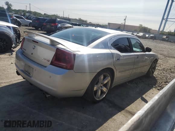 2007 Dodge Charger SRT-8 с VIN 2B3LA73W37H668188, выставлен на аукционе Copart как лот 68350674 с пробегом 150 769 миль миль и Списание • Salvage title. История ставок и продаж доступна на DreamBid. Изображение 3.