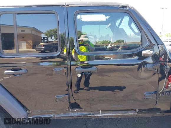 2023 Jeep Wrangler Sport S with VIN 1C4HJXDG7PW617662, listed as a IAAI auction lot 42725503 with Not provided miles and . Bid and sale history available at DreamBid. Image 13.