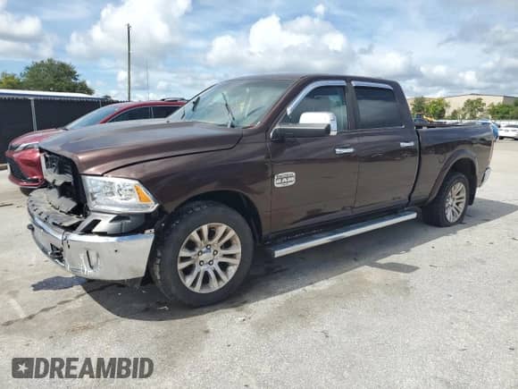 2015 Ram 1500 Laramie Limited с VIN 1C6RR7WM4FS679436, выставлен на аукционе Copart как лот 68109595 с пробегом 64 819 миль миль и Чистый • Clean title. История ставок и продаж доступна на DreamBid. Изображение 1.