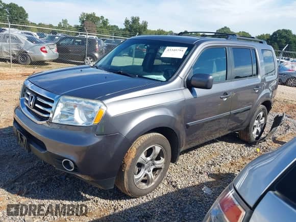 2014 Honda Pilot EX-L z VIN 5FNYF4H58EB016710, wystawiony jako IAAI lot #43349794 z przebiegiem 163 710 mil mil oraz . Historia ofert i sprzedaży dostępna na DreamBid. Obrazek 2.