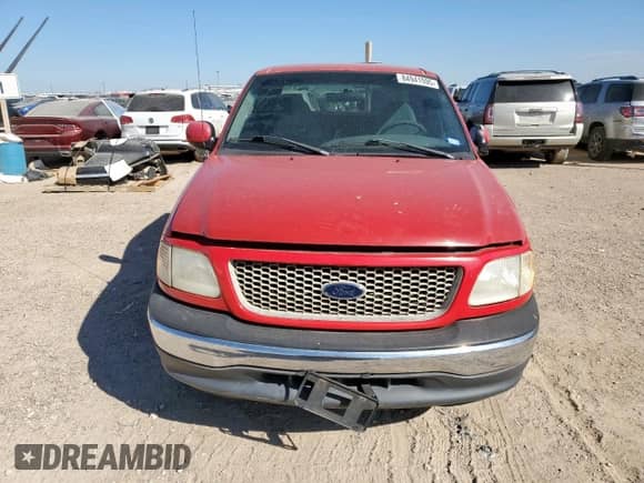 2000 Ford F-150 XL с VIN 1FTZX1720YNC39188, выставлен на аукционе Copart как лот 84941595 с пробегом Не указан миль и Списание • Salvage title. История ставок и продаж доступна на DreamBid. Изображение 5.