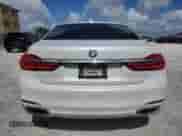 2017 BMW 7 Series 740i with VIN WBA7E2C31HG740674, listed as a Copart auction lot 62059545 with 97,551 mi miles and Salvage title. Bid and sale history available at DreamBid. Image 6.