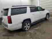 2015 Chevrolet Suburban LT with VIN 1GNSKJKC6FR635316, listed as a Copart auction lot 65336185 with 217,006 mi miles and Salvage title. Bid and sale history available at DreamBid. Image 3.