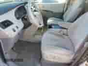 2011 Toyota Sienna LE with VIN 5TDKK3DC7BS121990, listed as a Copart auction lot 80665295 with 234,713 mi miles and Salvage title. Bid and sale history available at DreamBid. Image 7.