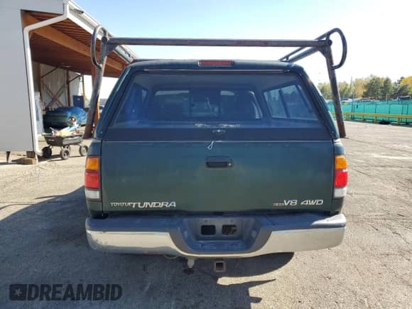 2001 Toyota Tundra SR5 с VIN 5TBBT44141S197594, выставлен на аукционе Copart как лот 87216325 с пробегом 268 189 миль миль и Чистый • Clean title. История ставок и продаж доступна на DreamBid. Изображение 6.