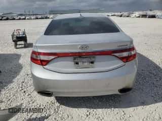 2014 Hyundai Azera Limited с VIN KMHFH4JG9EA396464, выставлен на аукционе Copart как лот 78434104 с пробегом 202 082 миль миль и Списание • Salvage title. История ставок и продаж доступна на DreamBid. Изображение 6.
