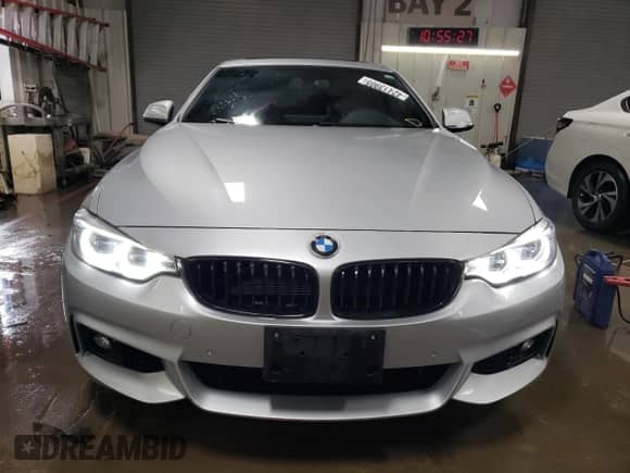 2016 BMW 4 Series 428i xDrive with VIN WBA4C9C52GG137735, listed as a Copart auction lot 42413905 with 79,476 mi miles and Salvage title. Bid and sale history available at DreamBid. Image 5.