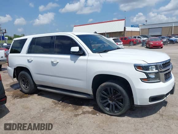 2015 Chevrolet Tahoe with VIN 1GNSK3KC7FR304028, listed as a IAAI auction lot 42755745 with 122,836 mi miles and . Bid and sale history available at DreamBid. Image 13.