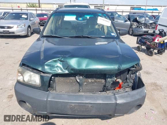 2005 Subaru Forester X with VIN JF1SG63635H700679, listed as a IAAI auction lot 42989089 with 77,512 mi miles and . Bid and sale history available at DreamBid. Image 11.