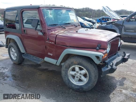 2001 Jeep Wrangler SE with VIN 1J4FA29P21P300094, listed as a IAAI auction lot 41871446 with 125,098 mi miles and . Bid and sale history available at DreamBid. Image 1.