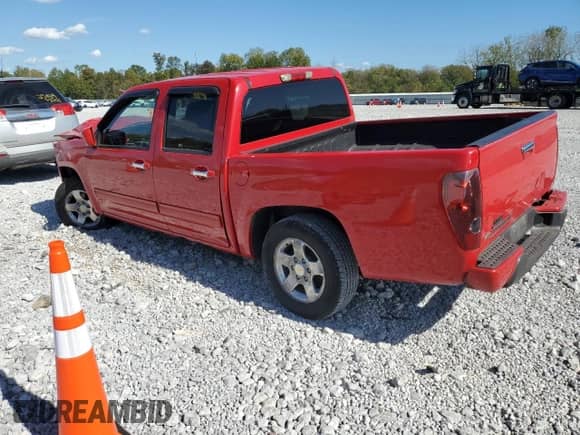 2011 Chevrolet Colorado 1LT with VIN 1GCDSCFE5B8106447, listed as a Copart auction lot 82274615 with 143,515 mi miles and Salvage title. Bid and sale history available at DreamBid. Image 2.