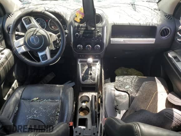 2015 Jeep Compass High Altitude with VIN 1C4NJDEB5FD324096, listed as a Copart auction lot 64557885 with 111,175 mi miles and Salvage title. Bid and sale history available at DreamBid. Image 8.