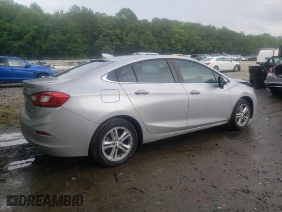 2017 Chevrolet Cruze LT z VIN 1G1BE5SM1H7100367, wystawiony jako Copart lot #65523495 z przebiegiem 183 592 mil mil oraz Szkoda całkowita • Salvage title. Historia ofert i sprzedaży dostępna na DreamBid. Obrazek 3.