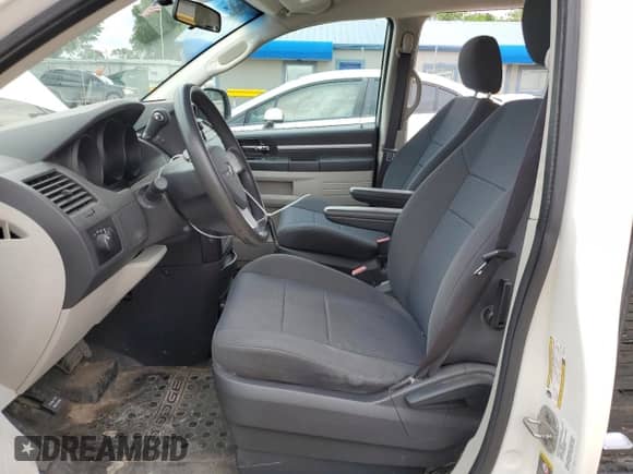 2010 Dodge Grand Caravan Cargo with VIN 2D4CN1AE6AR248763, listed as a Copart auction lot 55362704 with 103,671 mi miles and Salvage title. Bid and sale history available at DreamBid. Image 7.