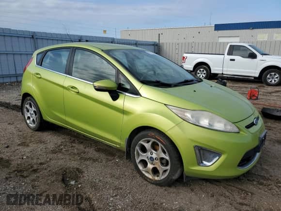 2011 Ford Fiesta SES with VIN 3FADP4FJ2BM148662, listed as a Copart auction lot 81871545 with 110,984 mi miles and Salvage title. Bid and sale history available at DreamBid. Image 4.