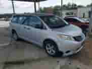 2014 Toyota Sienna L with VIN 5TDZK3DC0ES513289, listed as a Copart auction lot 69385975 with 340,709 mi miles and Clean title. Bid and sale history available at DreamBid. Image 4.