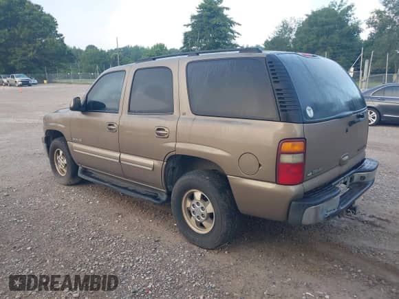 2003 Chevrolet Tahoe LT with VIN 1GNEK13Z23J136877, listed as a IAAI auction lot 42614204 with 133,009 mi miles and . Bid and sale history available at DreamBid. Image 3.
