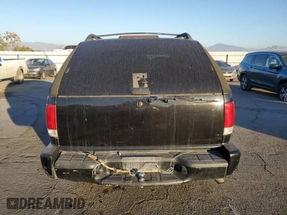 2000 Chevrolet Blazer LS с VIN 1GNCS18W9YK197621, выставлен на аукционе Copart как лот 81809994 с пробегом 339 155 миль миль и Списание • Salvage title. История ставок и продаж доступна на DreamBid. Изображение 6.