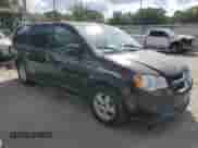 2012 Dodge Grand Caravan SXT with VIN 2C4RDGCG4CR104207, listed as a Copart auction lot 81743065 with 93,016 mi miles and Clean title. Bid and sale history available at DreamBid. Image 4.