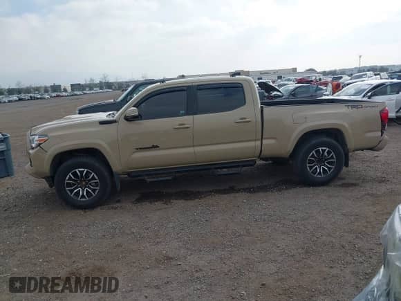 2020 Toyota Tacoma SR5 z VIN 3TMBZ5DN5LM026533, wystawiony jako IAAI lot #41529069 z przebiegiem 87 710 mil mil oraz . Historia ofert i sprzedaży dostępna na DreamBid. Obrazek 14.