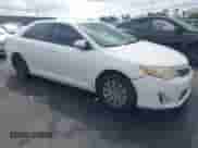 2012 Toyota Camry L z VIN 4T4BF1FK6CR226130, wystawiony jako IAAI lot #43221512 z przebiegiem 158 050 mil mil oraz . Historia ofert i sprzedaży dostępna na DreamBid. Obrazek 1.