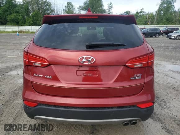 2016 Hyundai Santa Fe z VIN 5XYZWDLA2GG307823, wystawiony jako Copart lot #68878125 z przebiegiem 127 135 mil mil oraz Czysty tytuł • Clean title. Historia ofert i sprzedaży dostępna na DreamBid. Obrazek 6.