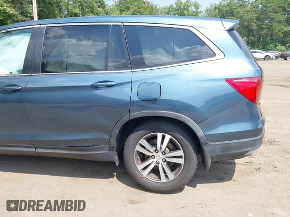 2018 Honda Pilot EX with VIN 5FNYF5H33JB033056, listed as a IAAI auction lot 42575125 with 95,543 mi miles and . Bid and sale history available at DreamBid. Image 6.