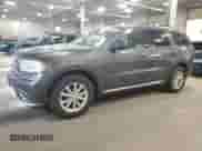 2014 Dodge Durango SXT with VIN 1C4RDHAG4EC300720, listed as a Copart auction lot 81941215 with 157,862 mi miles and Salvage title. Bid and sale history available at DreamBid. Image 1.