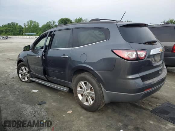 2013 Chevrolet Traverse LT with VIN 1GNKRJKD0DJ177272, listed as a Copart auction lot 58762365 with 71,735 mi miles and Salvage title. Bid and sale history available at DreamBid. Image 2.