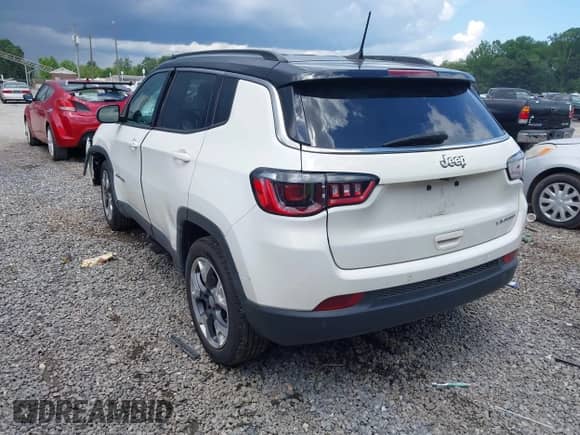 2018 Jeep Compass Limited with VIN 3C4NJCCB1JT188498, listed as a IAAI auction lot 42717751 with 84,227 mi miles and . Bid and sale history available at DreamBid. Image 3.