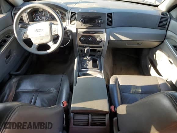 2007 Jeep Grand Cherokee Laredo with VIN 1J8GR48KX7C593322, listed as a Copart auction lot 71458485 with 166,252 mi miles and Salvage title. Bid and sale history available at DreamBid. Image 8.