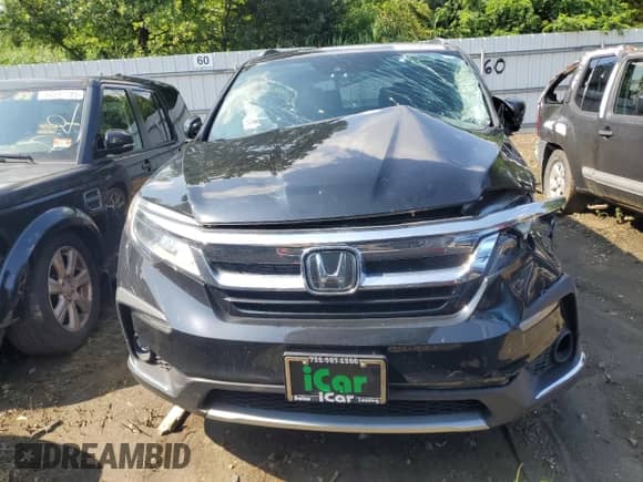 2022 Honda Pilot Touring 7-Passenger z VIN 5FNYF6H63NB093909, wystawiony jako Copart lot #63108395 z przebiegiem 25 903 mil mil oraz Szkoda całkowita • Salvage title. Historia ofert i sprzedaży dostępna na DreamBid. Obrazek 5.