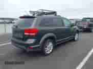 2014 Dodge Journey SXT with VIN 3C4PDDBG6ET141105, listed as a IAAI auction lot 43443646 with 164,188 mi miles and . Bid and sale history available at DreamBid. Image 4.